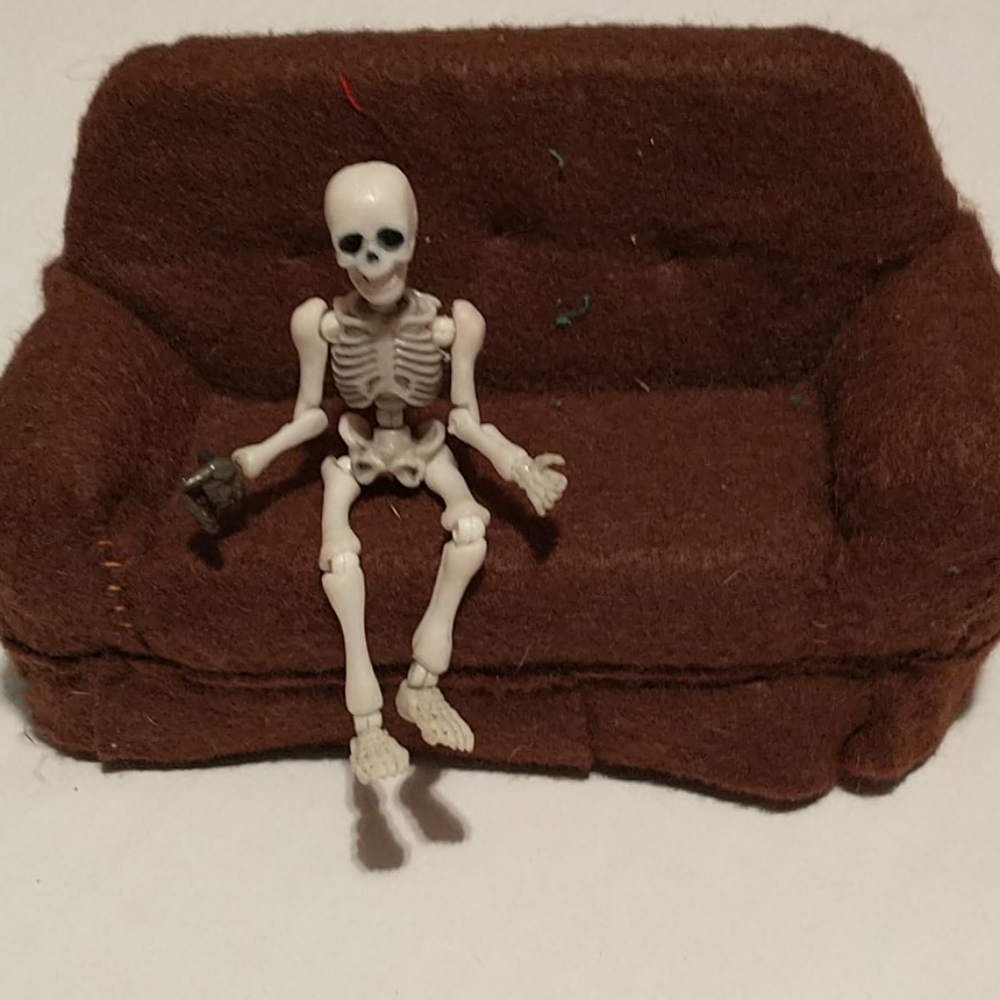Miniature brown felt sofa